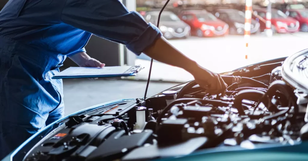 a technician working on a car