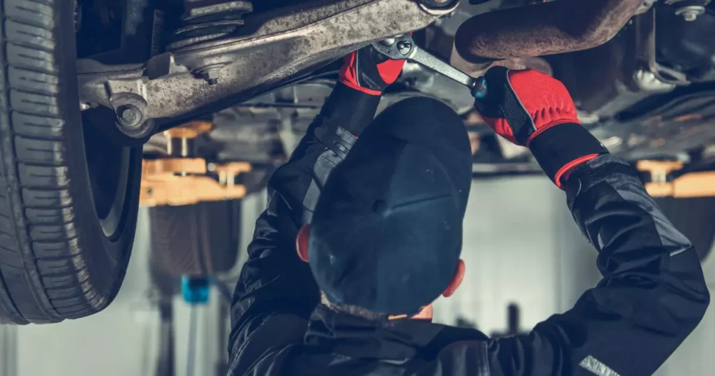 a mechanic working on a car